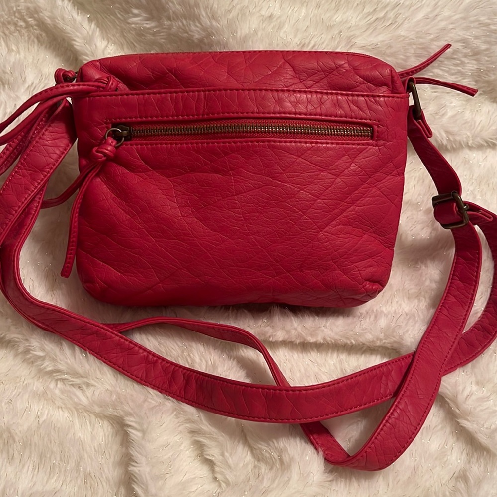 NWOT Bueno small crossbody bag. Very soft! Excellent condition.